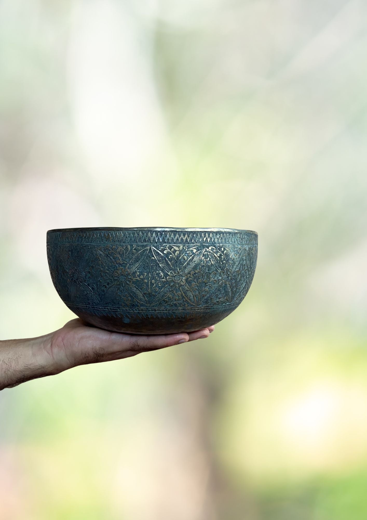 Vintage Flower Carved Singing Bowl for sound therapy.