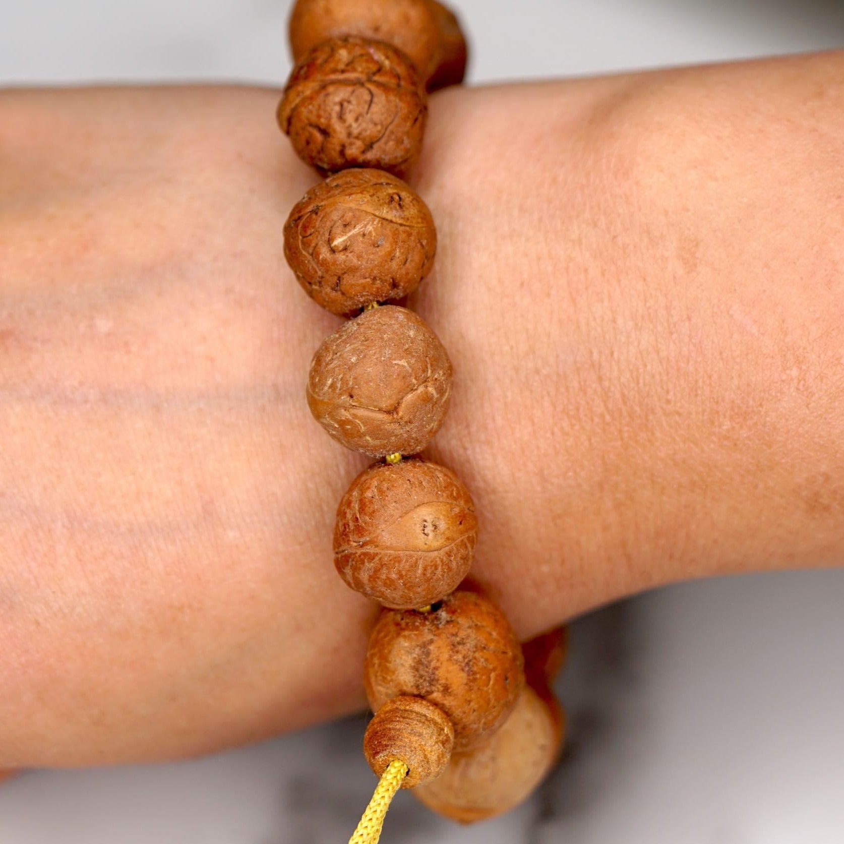 Bodhi Seed Bracelet being worn around wrist