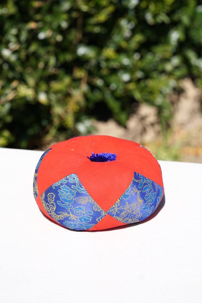 Singing bowl cushion hand embroidery in silk from Nepal
