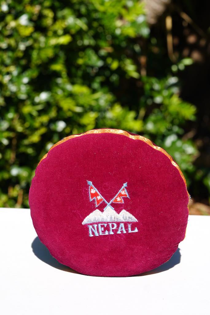 Singing bowl cushion hand embroidery in velvet Nepal