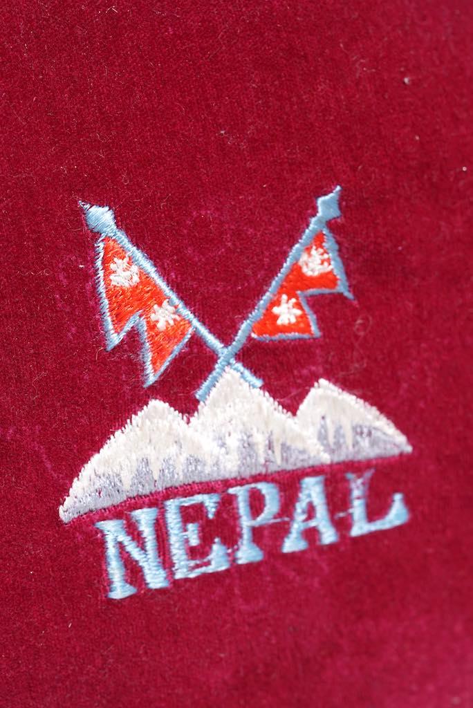 Singing bowl cushion hand embroidery in velvet Nepal