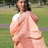 Ethically sourced biodegradable pashmina shawl from Nepal.  This salmon pink color pashmina shawl is most women favourite!