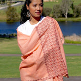 Ethically sourced biodegradable pashmina shawl from Nepal.  This salmon pink color pashmina shawl is most women favourite!