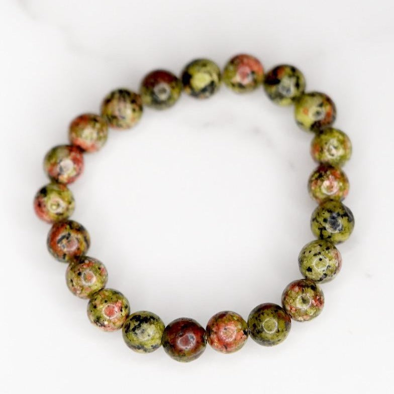Unakite is said to be a stone of vision, opening the third eye and useful for scrying. It is also believed to be a stone of balance, grounding the self while bringing emotions and spirituality together. 
