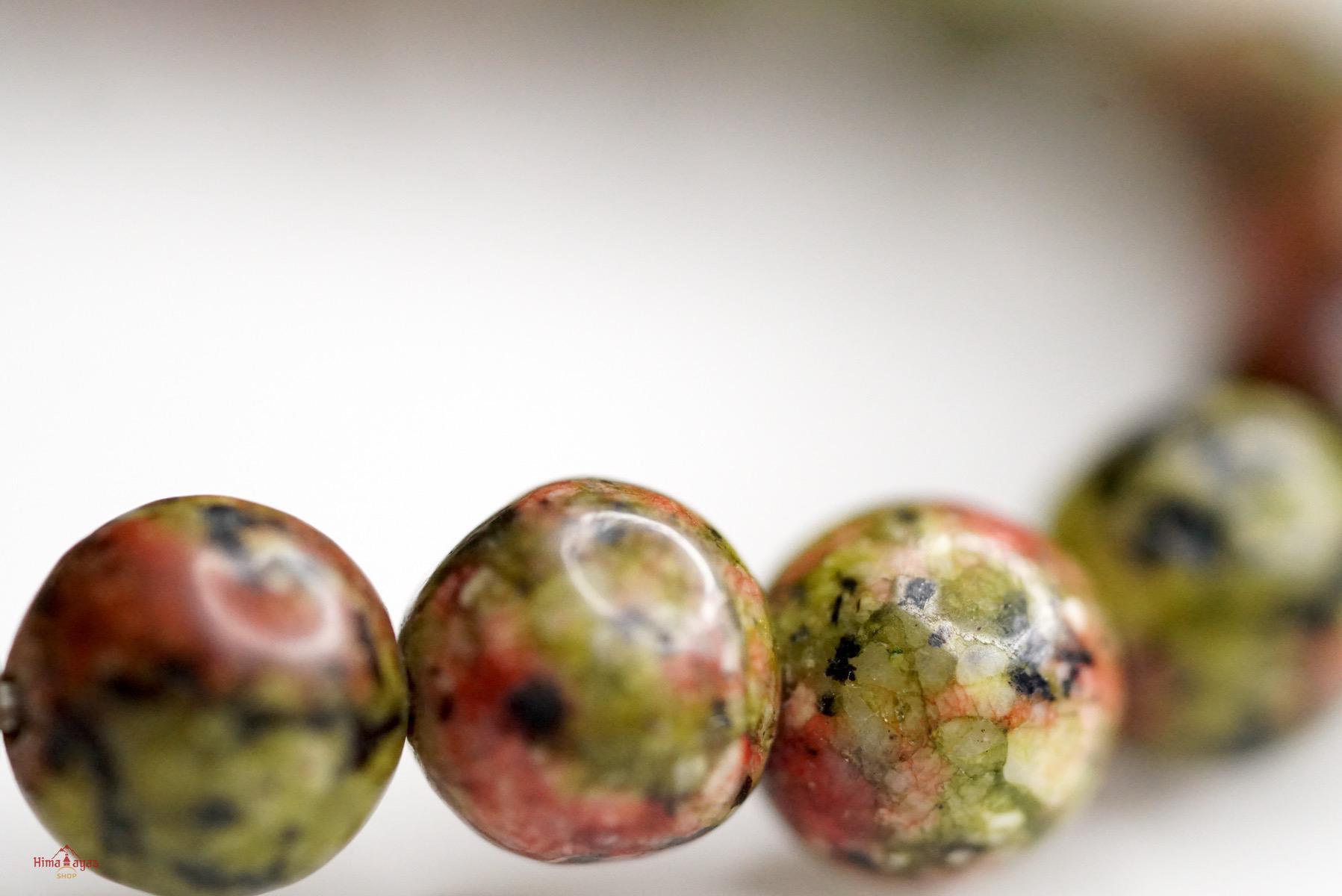 Unakite is said to be a stone of vision, opening the third eye and useful for scrying. It is also believed to be a stone of balance, grounding the self while bringing emotions and spirituality together.