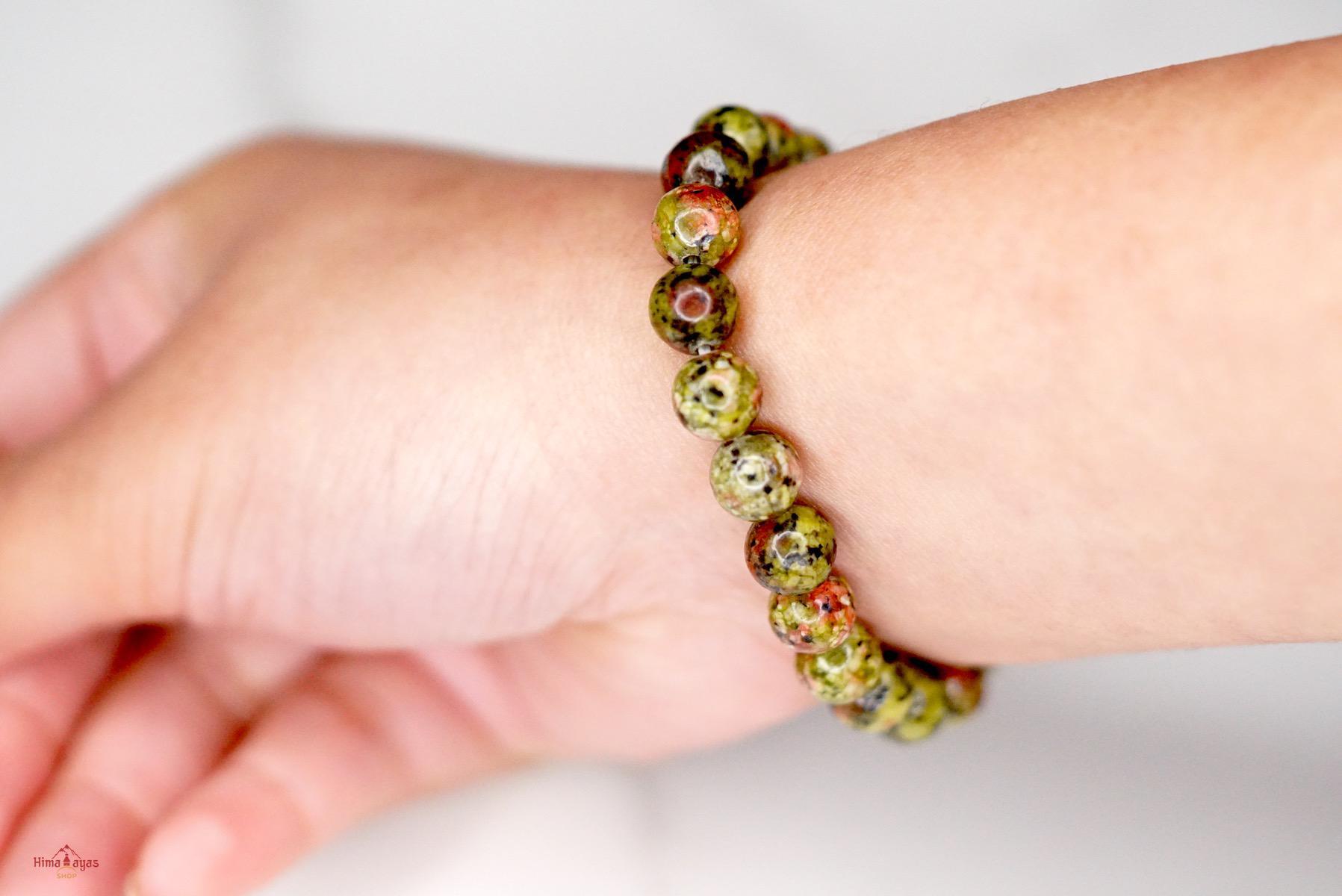 Unakite is said to be a stone of vision, opening the third eye and useful for scrying. It is also believed to be a stone of balance, grounding the self while bringing emotions and spirituality together.