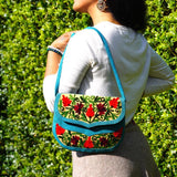 Beautiful handmade women's crossbody bag with floral embroidery design for chic boho style.