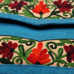 Beautiful handmade women's crossbody bag with floral embroidery design for chic boho style.