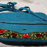 Beautiful handmade women's crossbody bag with floral embroidery design for chic boho style.