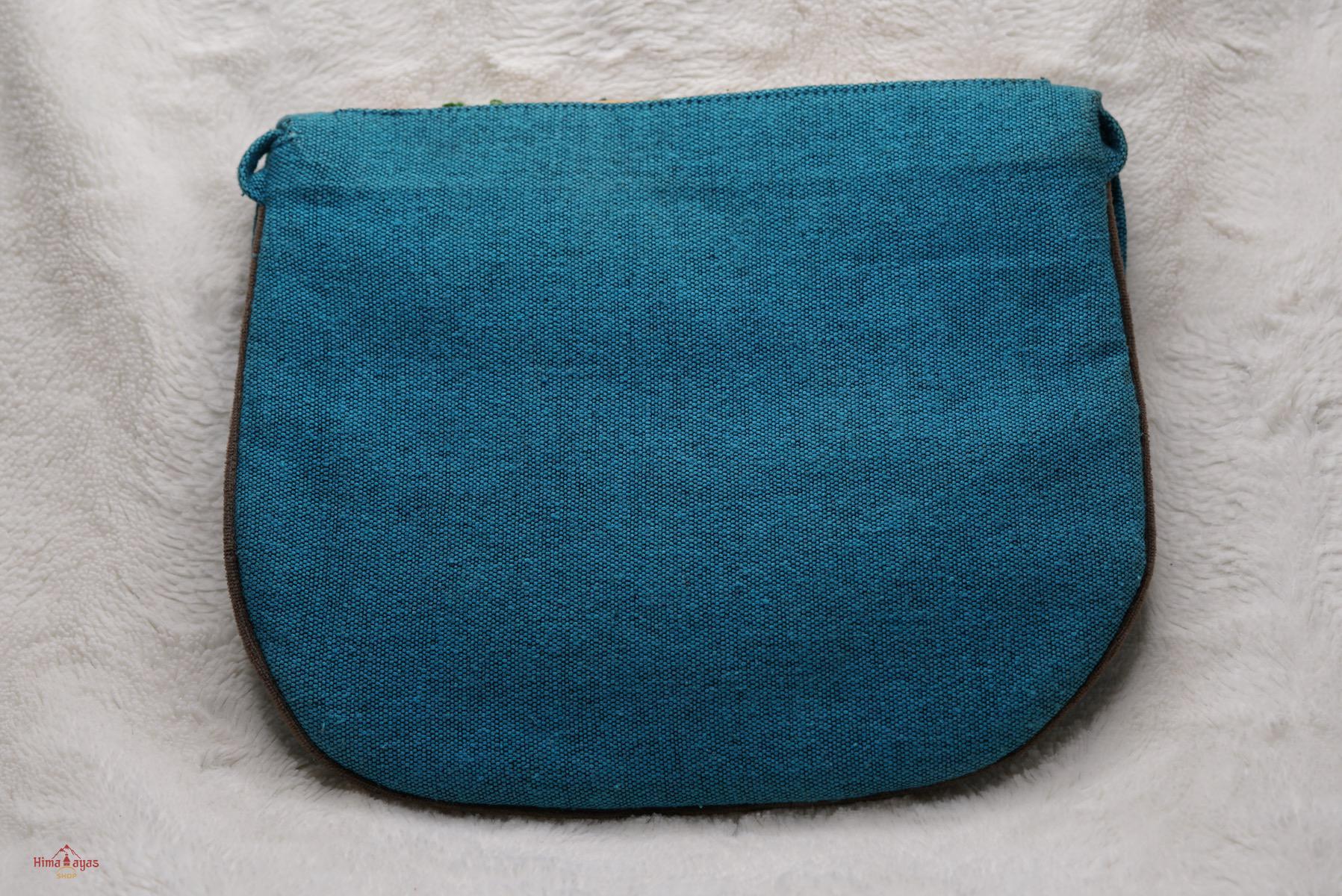 Beautiful handmade women's crossbody bag with floral embroidery design for chic boho style.