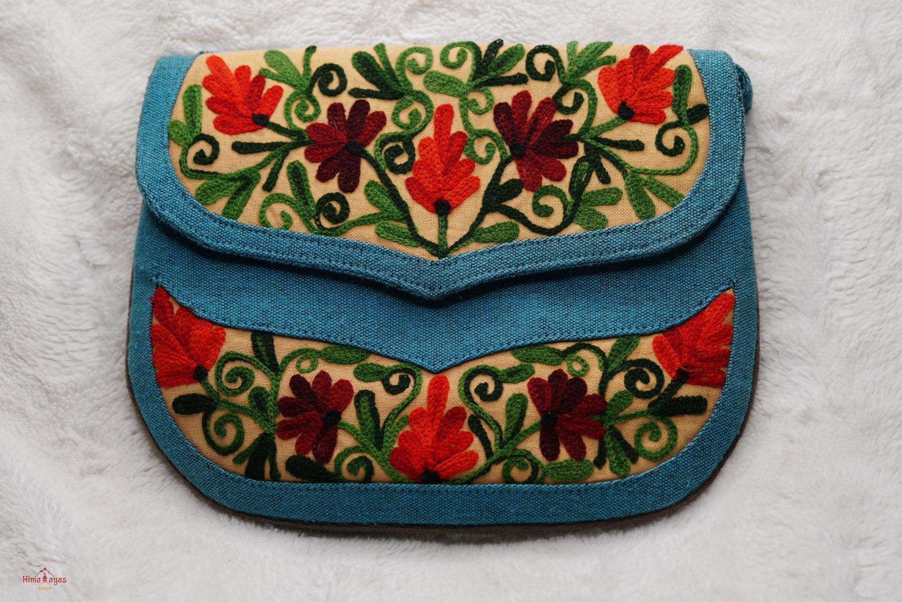 Beautiful handmade women's crossbody bag with floral embroidery design for chic boho style.