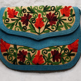 Beautiful handmade women's crossbody bag with floral embroidery design for chic boho style.