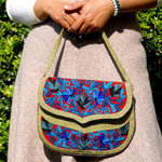 Beautiful hand embroidered crossbody bag with bright and multi-colour embroidered floral patterns.