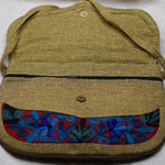 Beautiful hand embroidered crossbody bag with bright and multi-colour embroidered floral patterns.