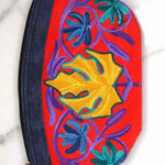 A special women pouch very light weight, ideal as a makeup bag or everyday use hand purse.