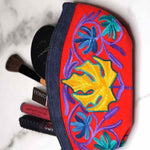 A special women pouch very light weight, ideal as a makeup bag or everyday use hand purse.
