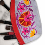 Women pouch purse with floral pattern, ultra-soft and lightweight. The pouch can be used as makeup bag or clutch that suit your style. Ethically made in Nepal.