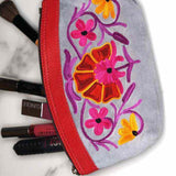 Women pouch purse with floral pattern, ultra-soft and lightweight. The pouch can be used as makeup bag or clutch that suit your style. Ethically made in Nepal.