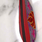 A special women pouch very light weight, ideal as a makeup bag or everyday use hand purse.