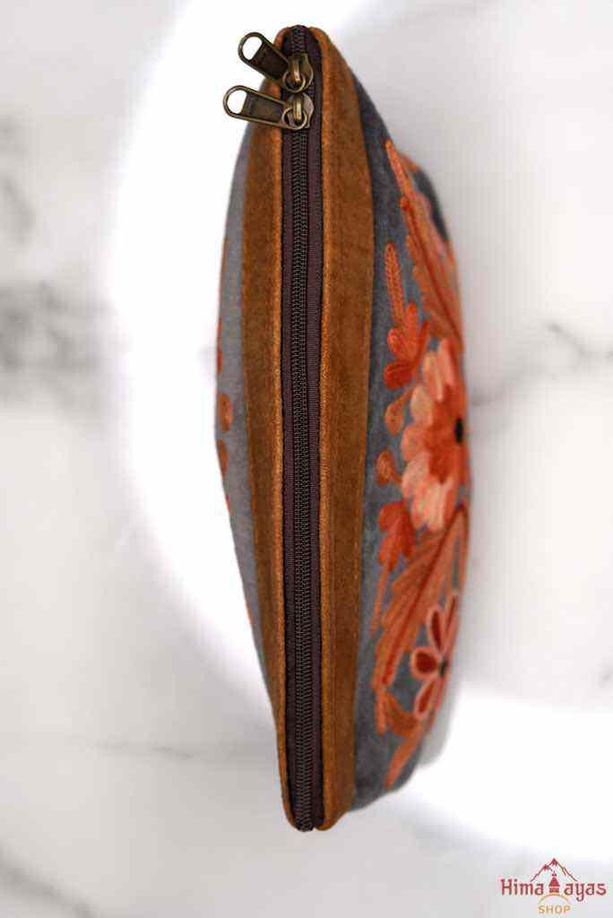Beautiful Cashmere design pouch made with hand-embroidery design with a very fine embellishment that involves elaborate and intricate floral motifs.