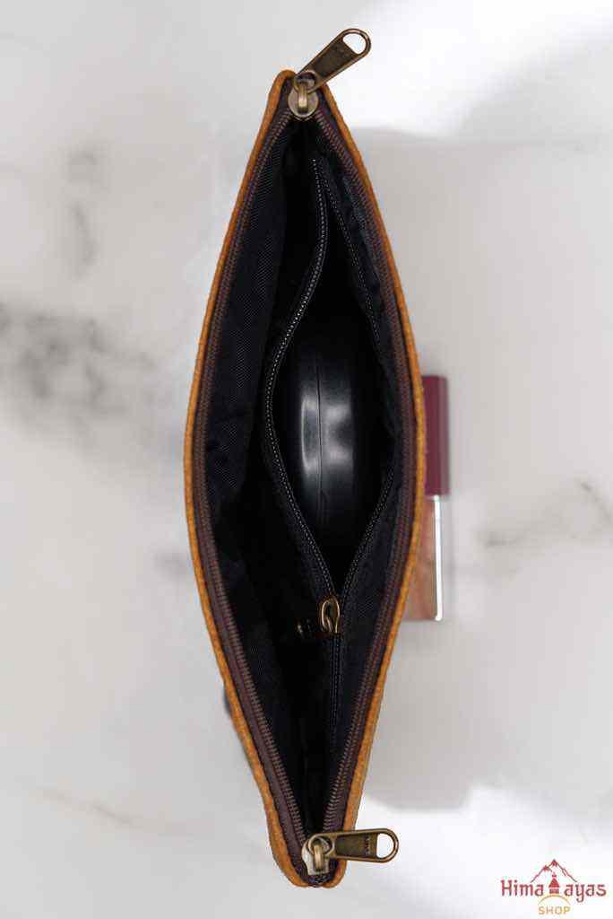 Beautiful Cashmere design pouch made with hand-embroidery design with a very fine embellishment that involves elaborate and intricate floral motifs.