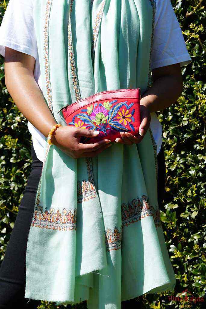 Beautiful Cashmere design pouch made with hand-embroidery design with a very fine embellishment that involves elaborate and intricate floral motifs.