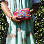 Beautiful Cashmere design pouch made with hand-embroidery design with a very fine embellishment that involves elaborate and intricate floral motifs.