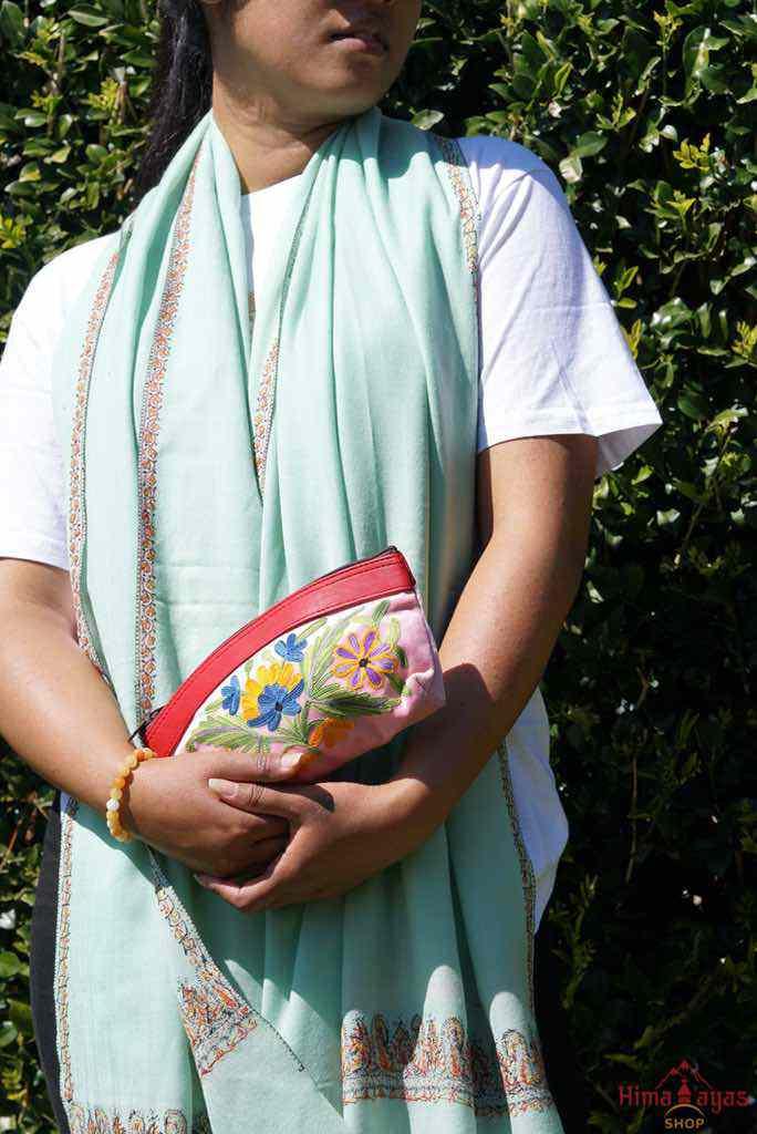 Beautiful Cashmere design pouch made with hand-embroidery design with a very fine embellishment that involves elaborate and intricate floral motifs.