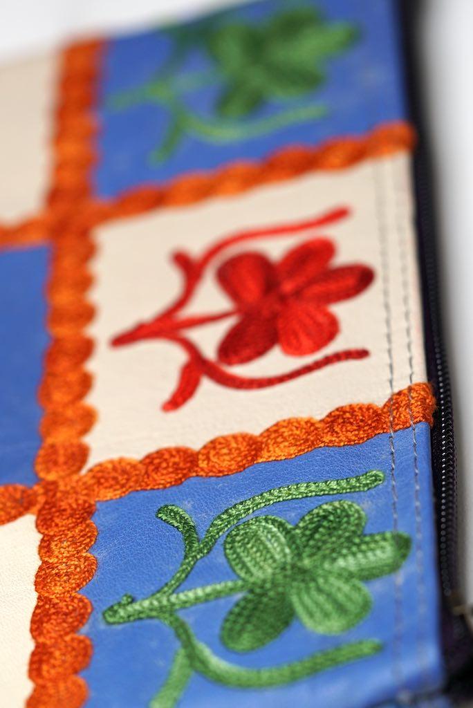 Beautiful handmade wristlet purse with Kashmiri embroidery for everyday use.