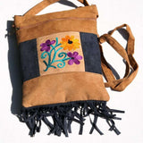 Easy to carry side bag for women, features a beautiful hand embroidered floral pattern.