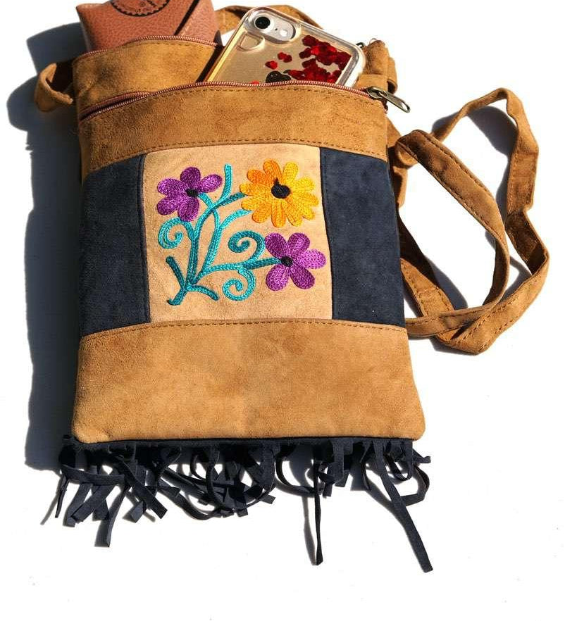 Easy to carry side bag for women, features a beautiful hand embroidered floral pattern.