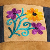 Easy to carry side bag for women, features a beautiful hand embroidered floral pattern.