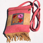 Easy to carry side bag for women, features a beautiful hand embroidered floral pattern.