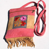 Easy to carry side bag for women, features a beautiful hand embroidered floral pattern.