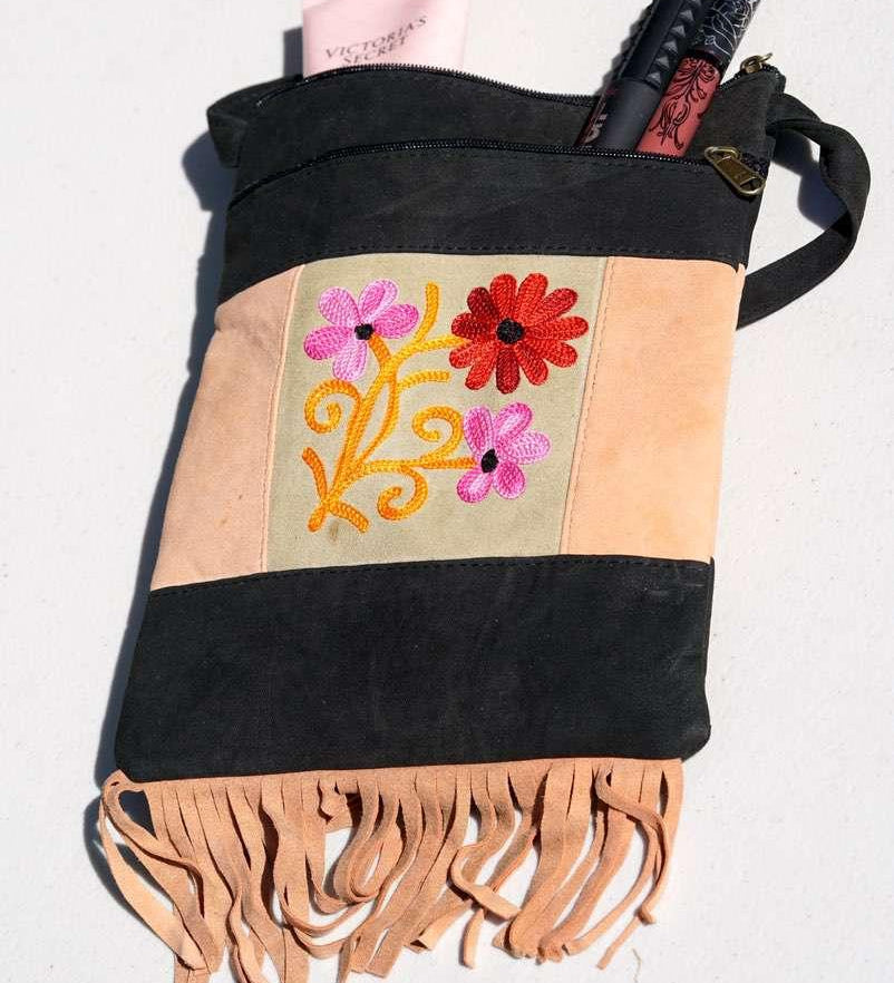 A unique style women's shoulder bag, crafted with beautiful cashmere floral embroidery to give it a chic stylish look..