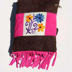 Easy to carry side bag for women, features a beautiful hand embroidered floral pattern.