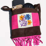Easy to carry side bag for women, features a beautiful hand embroidered floral pattern.