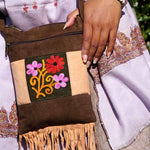 Absolutely stunning women's side bag with fringe/tassel to give you a bohemian chic look.