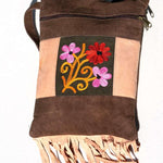 Absolutely stunning women's side bag with fringe/tassel to give you a bohemian chic look.