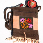 Absolutely stunning women's side bag with fringe/tassel to give you a bohemian chic look.