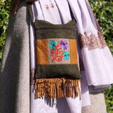 A unique style women's sling bag, crafted with beautiful cashmere floral embroidery to give it a chic stylish look.