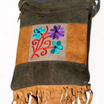A unique style women's sling bag, crafted with beautiful cashmere floral embroidery to give it a chic stylish look.