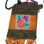 A unique style women's sling bag, crafted with beautiful cashmere floral embroidery to give it a chic stylish look.
