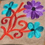 A unique style women's sling bag, crafted with beautiful cashmere floral embroidery to give it a chic stylish look.