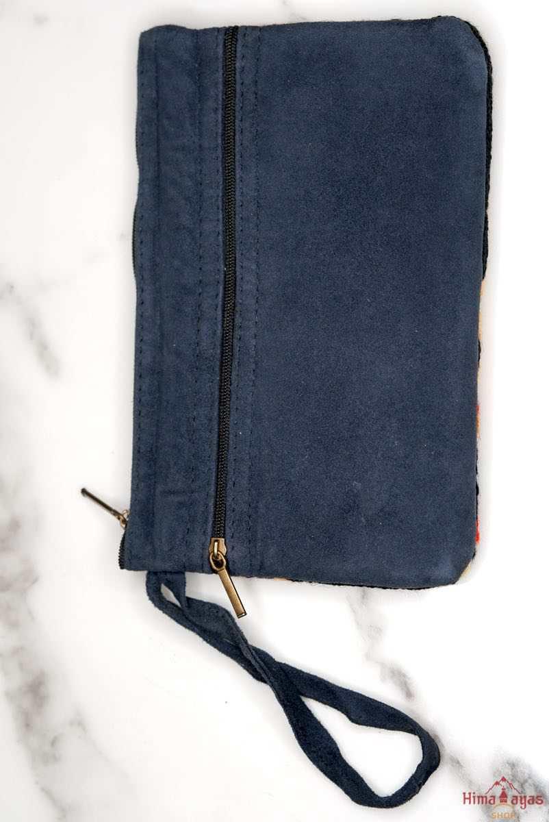 A stylish yet convenient hand woven wristlet purse with beautiful floral pattern, It has a secure zip top closure and two extra compartments for your everyday essentials making it easy to travel simple and light.