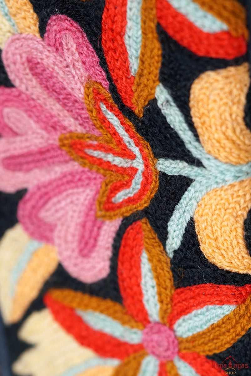 A stylish yet convenient hand woven wristlet purse with beautiful floral pattern, It has a secure zip top closure and two extra compartments for your everyday essentials making it easy to travel simple and light.