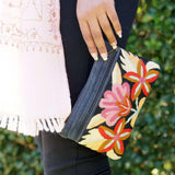 A stylish yet convenient hand woven wristlet purse with beautiful floral pattern, It has a secure zip top closure and two extra compartments for your everyday essentials making it easy to travel simple and light.