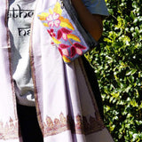 Beautiful flower pattern woman's purse that features a wristlet and secure zip top closure.