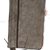 A stylish yet convenient hand woven wristlet purse with beautiful floral pattern, It has a secure zip top closure and two extra compartments for your everyday essentials making it easy to travel simple and light.