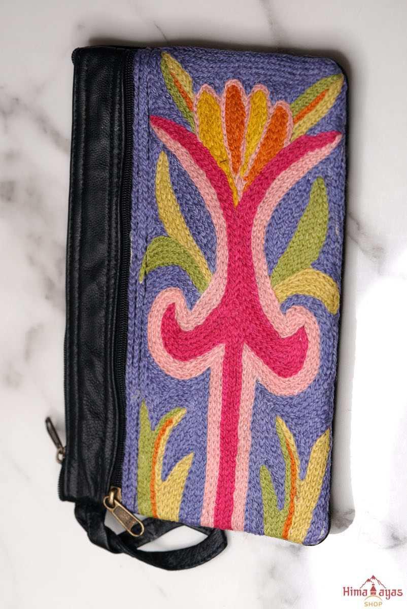 A stylish and ethically made wristlet purse to carry all your everyday essentials.